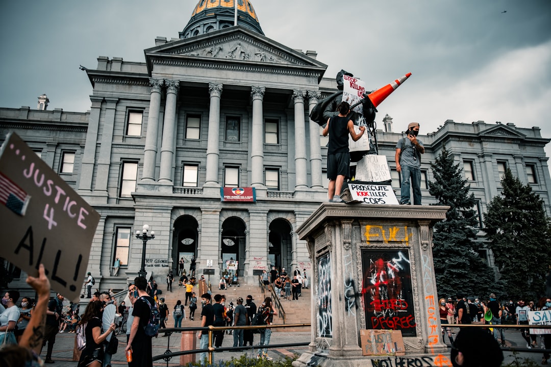 Denver's Federal Gun Law Fight Meets a Violent Year on Streets